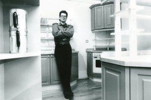 Young Mark Lewis in kitchen in black and white